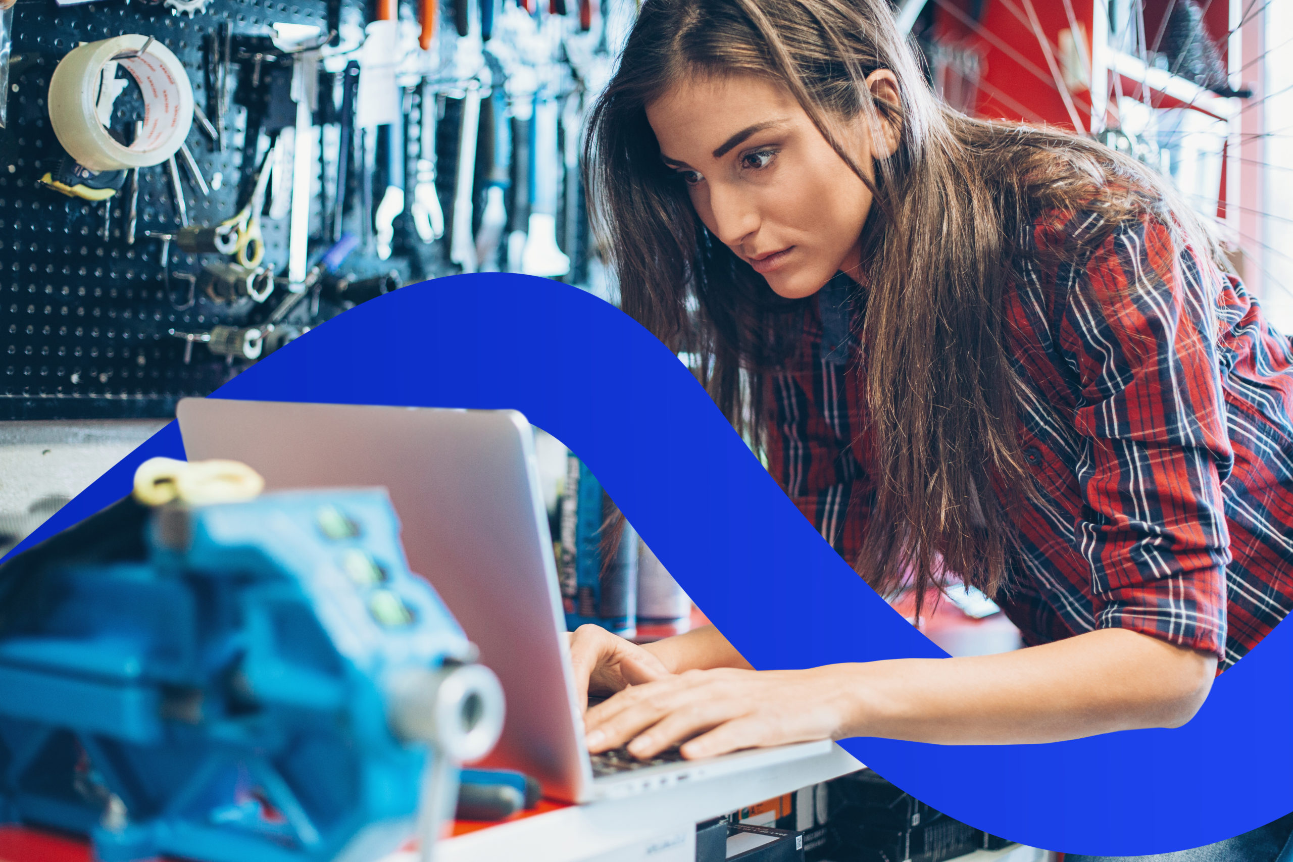 Female mechanic with laptop